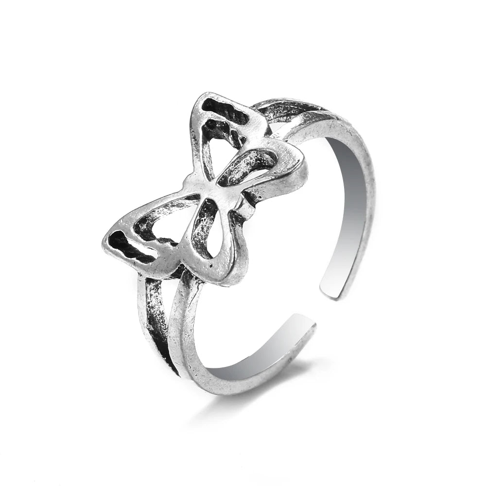 Bague vintage gothique en forme de tête de mort et d'ange pour femme, style hip-hop, couleur argent, papillon, cœur, tendance 2021
