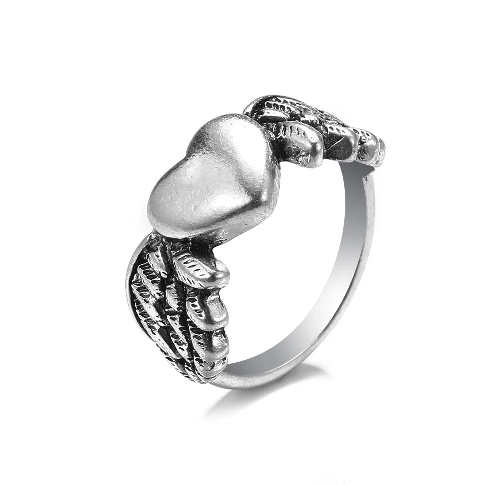 Bague vintage gothique en forme de tête de mort et d'ange pour femme, style hip-hop, couleur argent, papillon, cœur, tendance 2021