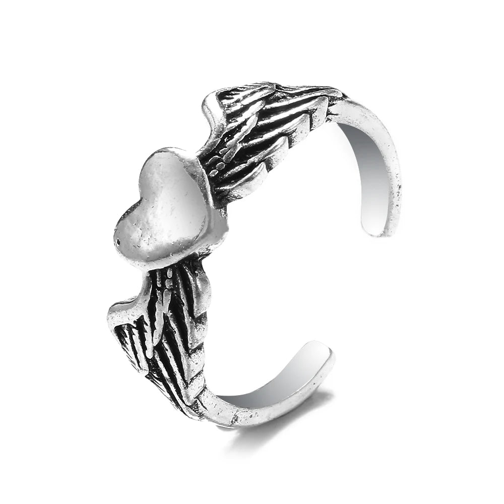 Bague vintage gothique en forme de tête de mort et d'ange pour femme, style hip-hop, couleur argent, papillon, cœur, tendance 2021